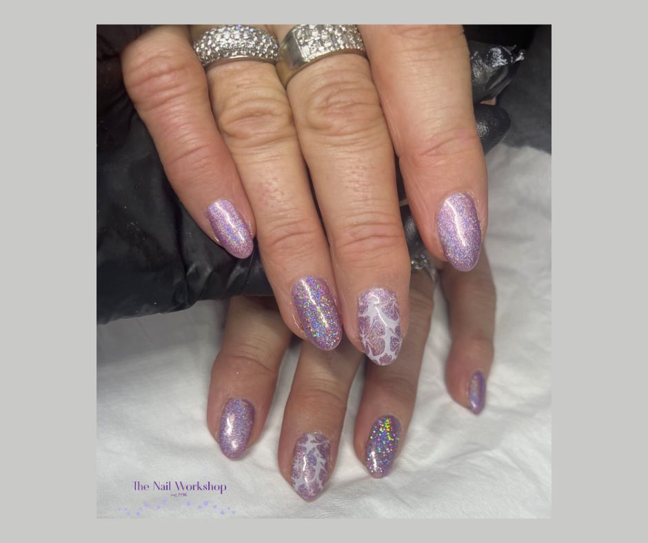 Pale pink hologram glitter with white reversed flower stamping